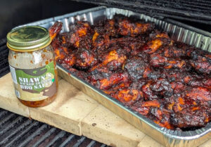Photo of BBQ chicken and sauce